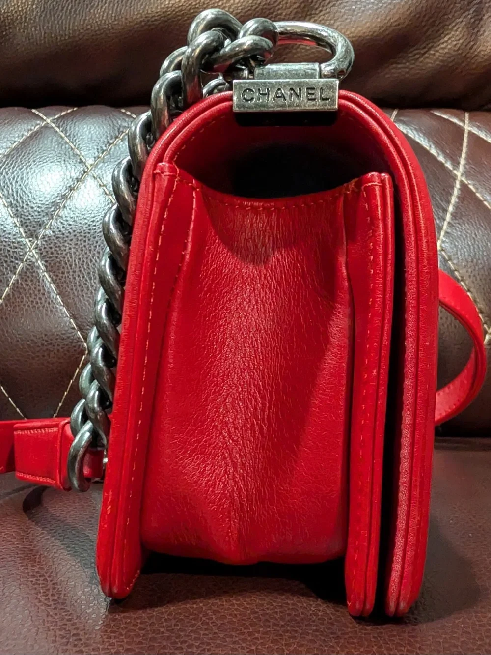 CHANEL Red leather small Boy with gunmetal tone chain